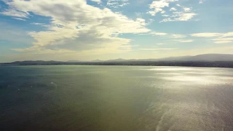 Drone moving forward shot of Sandymount Strand Stock Footage 272600725