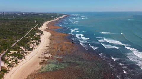 Drone Moving Forward Towards Beacon with Sea, Coast, Waves, Green Landscape, Coa Stock Footage 306313950
