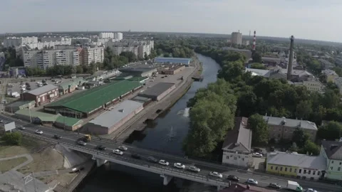 Drone moving forward upward over Noginsk river Видео 332683295