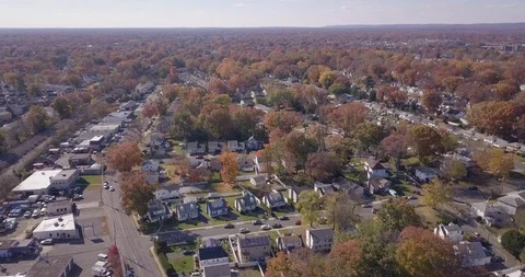 Drone moving foward over fall town 스톡 동영상 98436918
