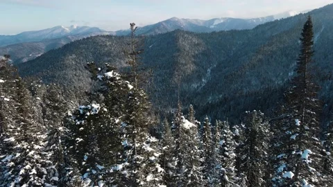 Drone moving up in front of the mountains at high altitude. Stockbeeldmateriaal 148723165