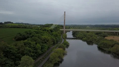 Drone moving left to right in front of a bridge 스톡 동영상 108919211