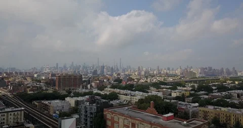 Drone moving over Bronx with Manhattan skyline background Video stock 114368610