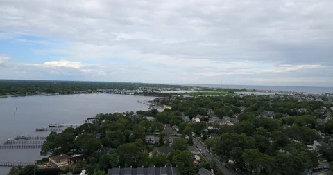 Drone moving over ocean town bay yacht club Video stock 111400348