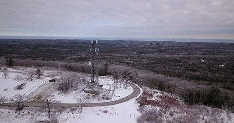 Drone moving passed electric tower in winter 動画素材 124509548