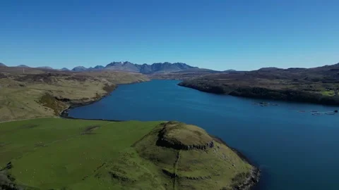 Drone moving right along river valley in Scotland 動画素材 334458242