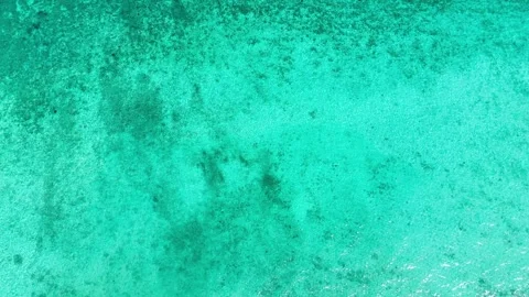 Drone moving right-to-left over turquoise waters at Koh Ngai, Thailand – 4K Video stock 325022354