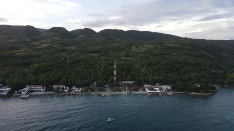 Drone is moving sideways looking to the beach Stock Footage 301614469