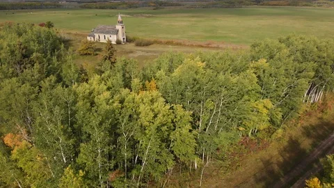 Drone moving slowly over an abandoned and dilapidated church. Stock Footage 116838412
