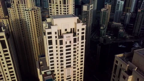 Drone Moving to Top Down Over Isolated Dubai Skyscraper Stock Footage 333899895