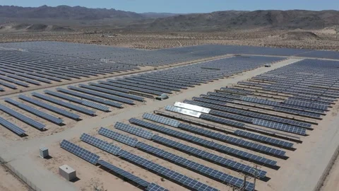 Drone moving toward corner of solar farm - shot 4K Stock Footage 150649310