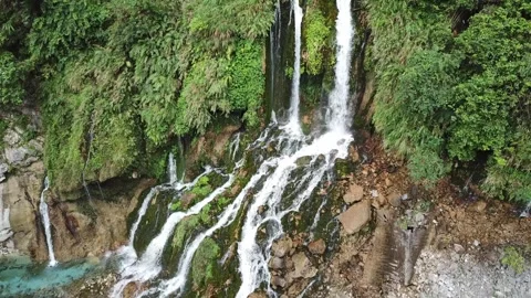 Drone moving toward waterfall with downward tilt (Taiwan) Stock Footage 329052280