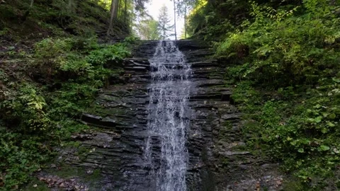 Drone Moving Towards Bursuc Waterfall with Upward Tilt Putna Slow Motion Vidéo 288719939