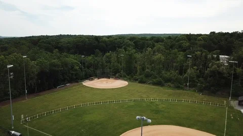 Drone moving towards empty baseball field Stock Footage 111400222
