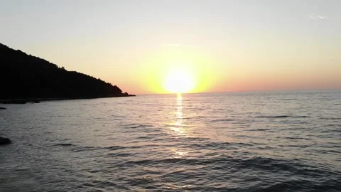 Drone moving towards the sun sunset sun Stock Footage 138080396