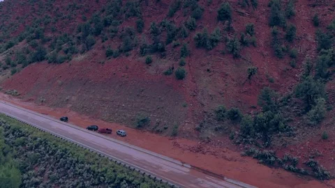 Drone:  Mud Slide Down Mountain Traps Vehicles Stock Footage 281575109