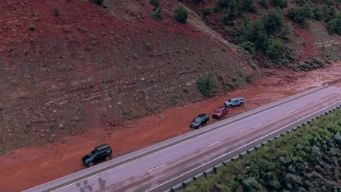 Drone:  Mud Slide On Mountain Highway Traps Cars Stock Footage 281575090