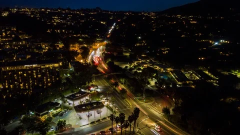 Drone night hyperlapse nightlapse of busy street and hotel at night 库存影片 87956176