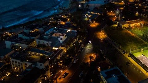 Drone night hyperlapse of resort town of La Jolla as camera pulls back Stock Footage 86832774