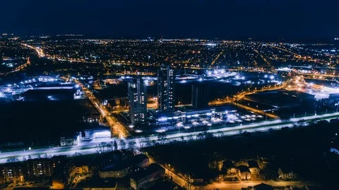 Drone Night Timelepse Riga city hypperlapse block of flats Drone Flight daugava Stock Footage 88816196