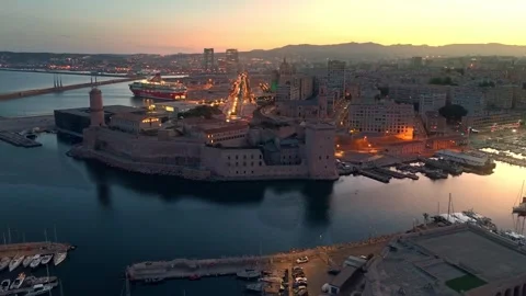Drone night view of Marseille harbour with night lights and fort Saint Nicolas 스톡 동영상 280143884