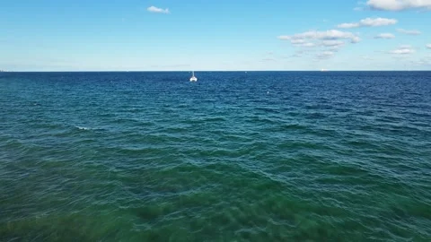 Drone Ocean 4K Cinematic Drop Down B-Roll Beach Stock Footage 293404020