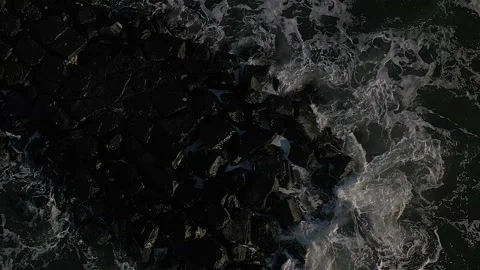 Drone ocean spins over waves crash rocks5  120fps Stock Footage 151540559
