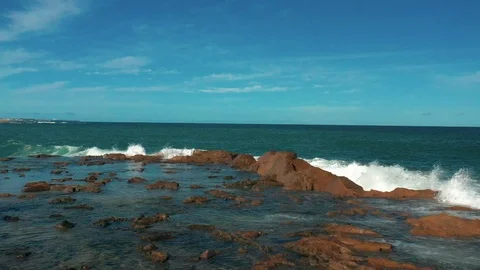 Drone - Ocean waves crashing down on rocks Stock Footage 127243062
