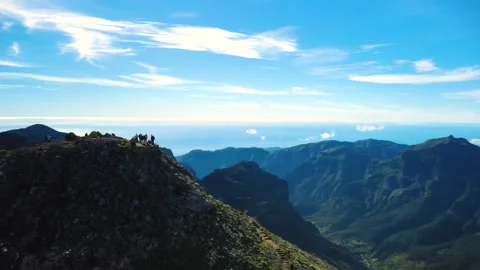 Drone offset orbit of Pico Ruivo summit and hikers, Madeira Vídeos de archivo 328640805