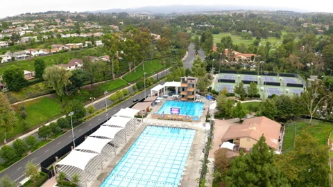 Drone Olympic Public Pool And Surrounding Areas 4K 30FPS Stock Footage 195256432