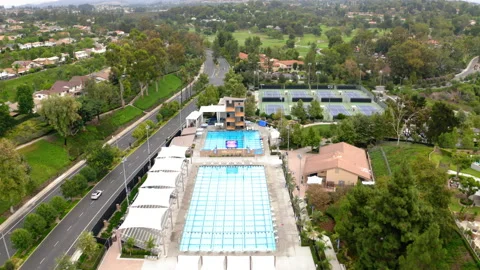 Drone Olympic Public Pool Tilting Down 4K 30FPS Stock Footage 195271139