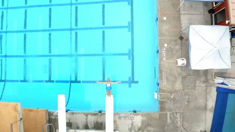 Drone Olympic Public Pool Top Down On Swimming Lanes 4K 30FPS Stock Footage 195252947