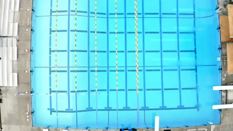 Drone Olympic Public Pool Top Down Of Lines And Lanes 4K 30FPS Stock Footage 195256553