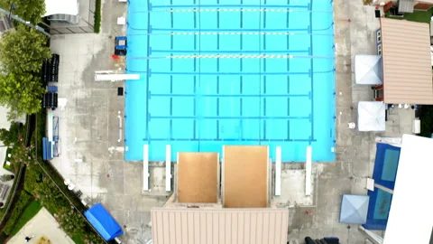 Drone Olympic Public Pool Top Down Flyover Lanes 4K 30FPS Stock Footage 195259497