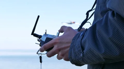 Drone Operator  Holding A Transmitter. Hands close up. 4K 3840x2160 Vídeo Stock 49058351