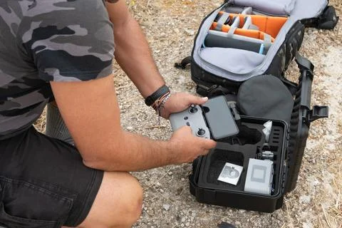 Drone operator preparing his drone for flight Stock Photos