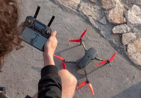 Drone operator prepping flight Stock Photos