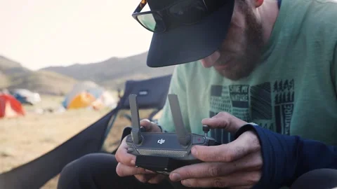 Drone operator with remote control Vídeos de archivo 242356306