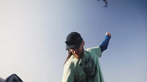 Drone operator take off his quadcopter Vídeos de archivo 243877333