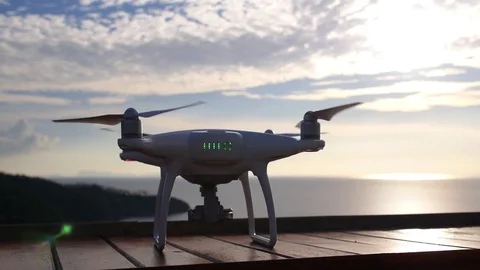 Drone or Quadcopter Take Off Against Sunset Sky Stock Footage 74418129
