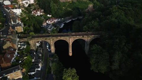 Drone orbit above huge stone historic bridge in north yorkshire, in the english Stock-Footage 321440223