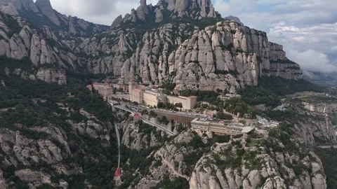 Drone orbit of ancient monastery on dramatic mountain cliffs Stock Footage 321345999