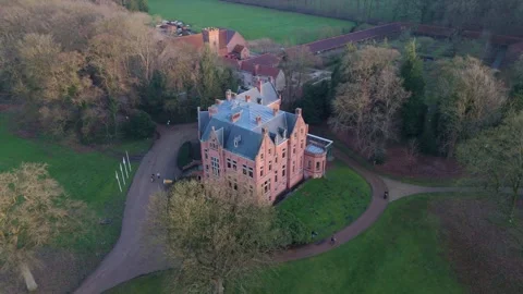 Drone Orbit Around Castle in Winter Forest, Belgium | FlyLens Stockbeeldmateriaal 328238863