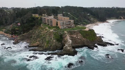 Drone Orbit Around Cliffside Residential Complex in Puchuncavi Chile Stock Footage 337144129