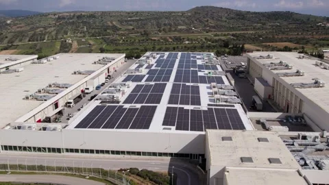 Drone orbit around completed rooftop solar panel installation Stock Footage 330671310