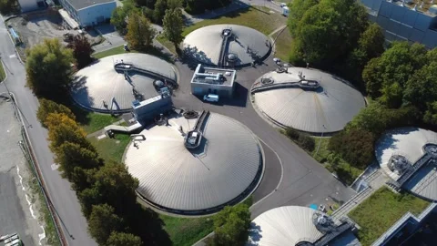 Drone Orbit Around Covered Sludge Treatment Tanks in Munich Stock-Footage 347716753
