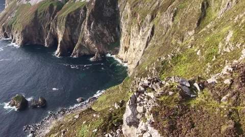Drone orbit around dramatic sea cliffs and Atlantic Ocean at Sliabh Liag Stock Footage 342667299