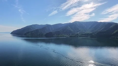Drone Orbit Around Forested Peninsula on Lake Biwa Japan Stock Footage 336406394