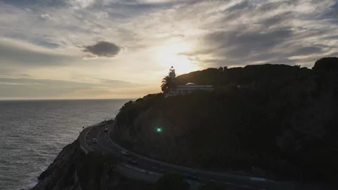 Drone Orbit Around Lighthouse at Sunset, Costa Brava, Spain Stock Footage 319861125