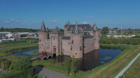 Drone orbit around a medieval castle surrounded by water Stock Footage 339684578